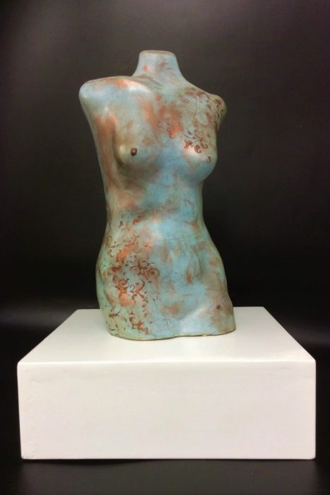 slip-cast torso with copper coloured decoration